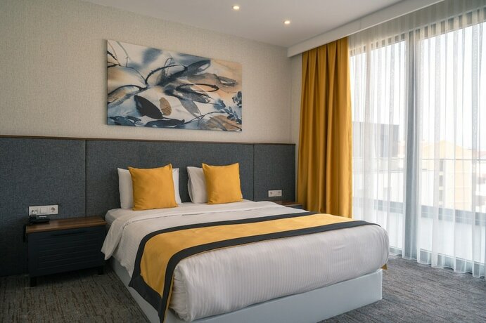 Imagen de la habitación del Hotel Leo Suites. Foto 15