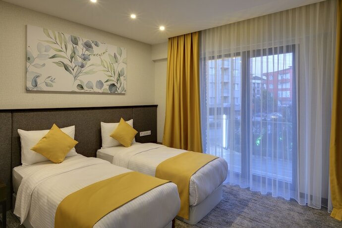 Imagen de la habitación del Hotel Leo Suites. Foto 20