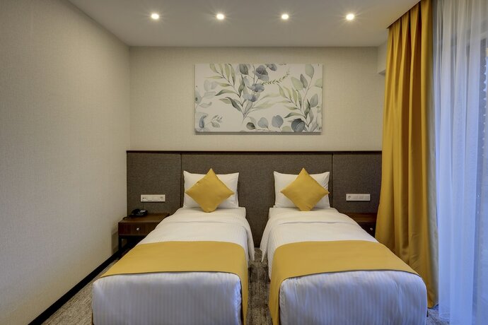 Imagen de la habitación del Hotel Leo Suites. Foto 22