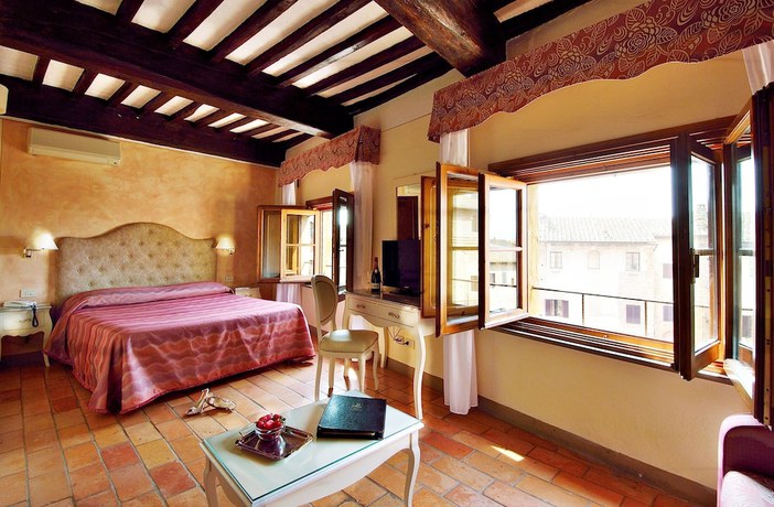 Imagen de la habitación del Hotel Leon Bianco. Foto 8