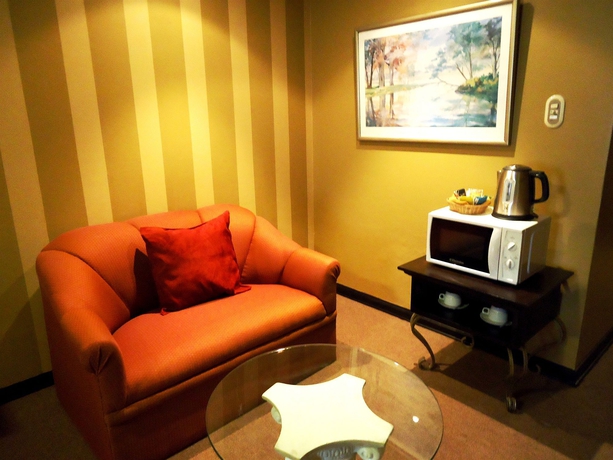 Imagen de la habitación del Hotel Leon De Oro Inn & Suites. Foto 2