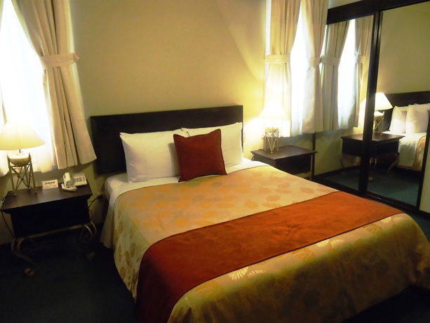 Imagen de la habitación del Hotel Leon De Oro Inn & Suites. Foto 6
