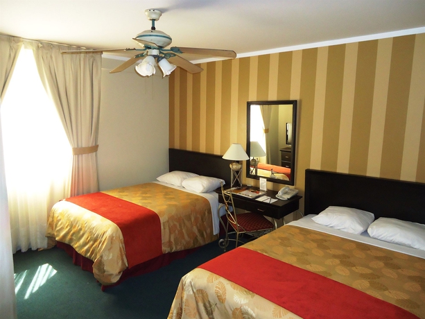 Imagen de la habitación del Hotel Leon De Oro Inn & Suites. Foto 10