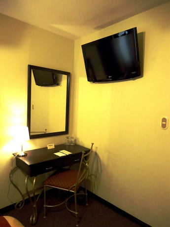 Imagen de la habitación del Hotel Leon De Oro Inn & Suites. Foto 12
