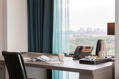 Imagen de la habitación del Hotel Leonardo Amsterdam Rembrandtpark. Foto 11