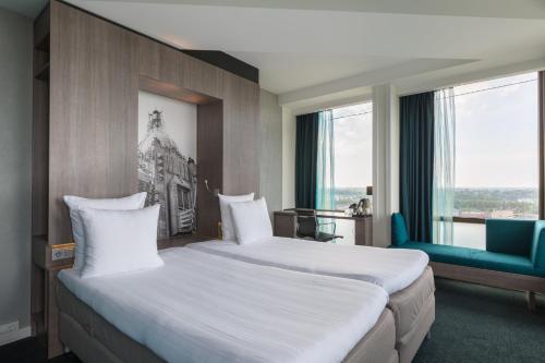 Imagen de la habitación del Hotel Leonardo Amsterdam Rembrandtpark. Foto 19
