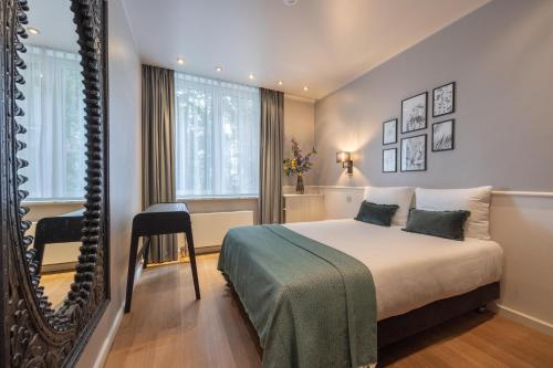 Imagen de la habitación del Hotel Leonardo Antwerp The Plaza. Foto 19