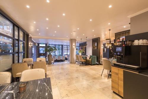 Imagen del bar/restaurante del Hotel Leonardo Antwerp The Plaza. Foto 12