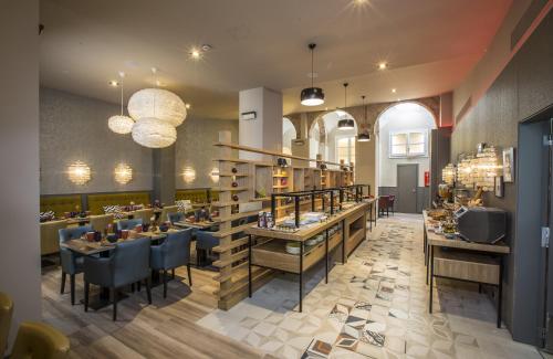 Imagen del bar/restaurante del Hotel Leonardo Barcelona Las Ramblas. Foto 11