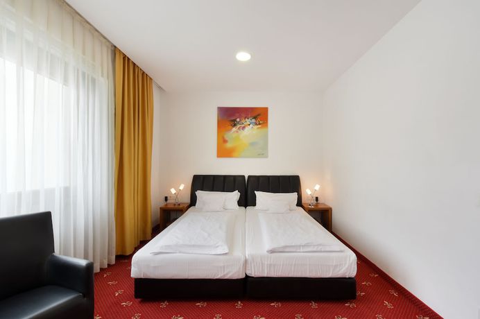 Imagen de la habitación del Hotel Leonardo Berlin KU'DAMM. Foto 11