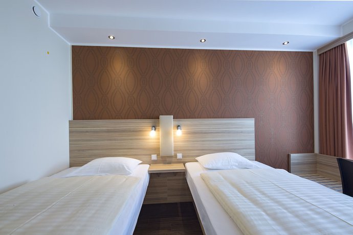 Imagen de la habitación del Hotel Leonardo Boutique Hotel Linz City Center. Foto 8