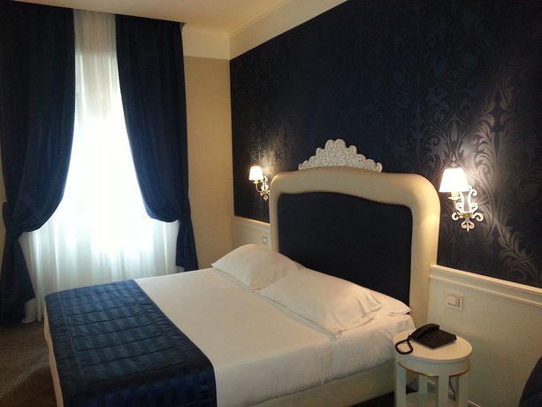 Imagen de la habitación del Hotel Leonardo Boutique Hotel Rome Monti. Foto 9