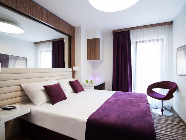 Imagen de la habitación del Hotel Leonardo Boutique Krakow City Center. Foto 4