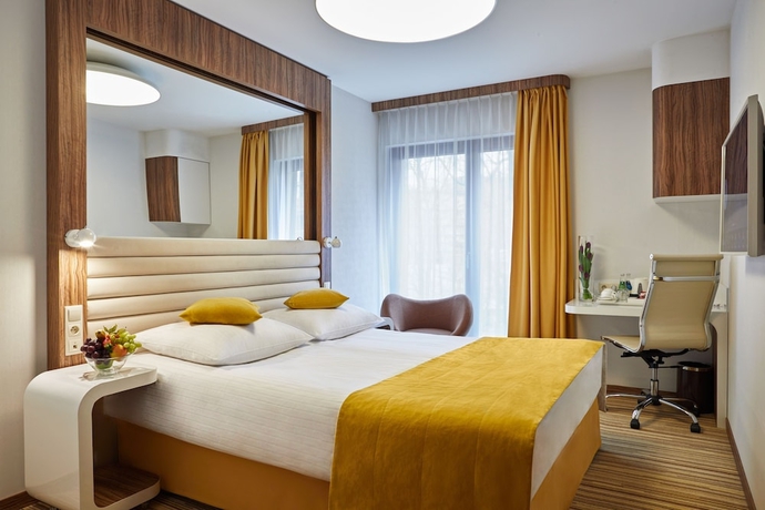 Imagen de la habitación del Hotel Leonardo Boutique Krakow City Center. Foto 8