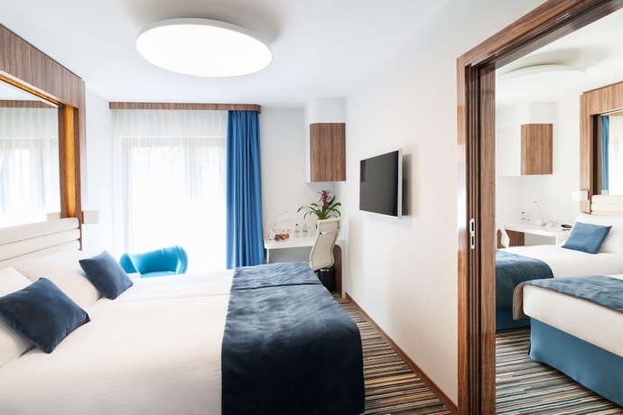 Imagen de la habitación del Hotel Leonardo Boutique Krakow City Center. Foto 10