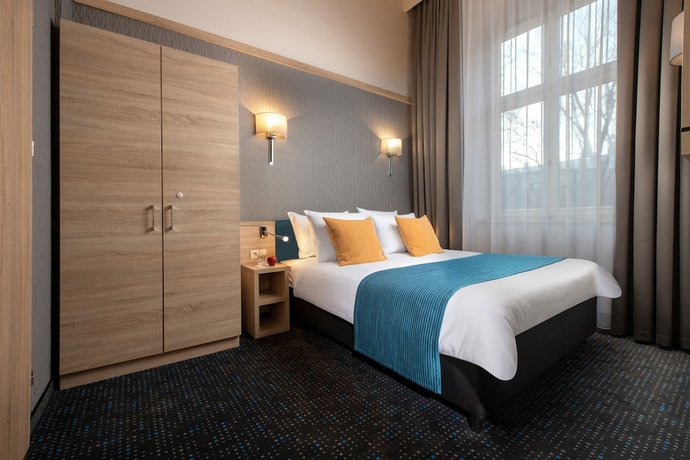 Imagen de la habitación del Hotel Leonardo Boutique Krakow Old Town. Foto 10