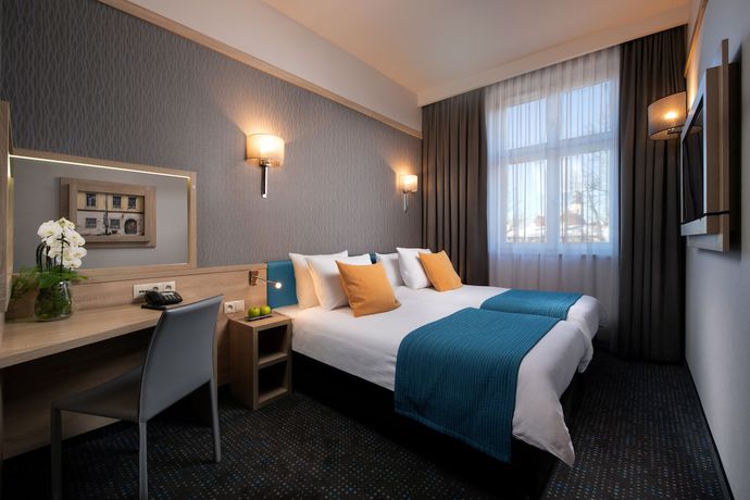 Imagen de la habitación del Hotel Leonardo Boutique Krakow Old Town. Foto 11