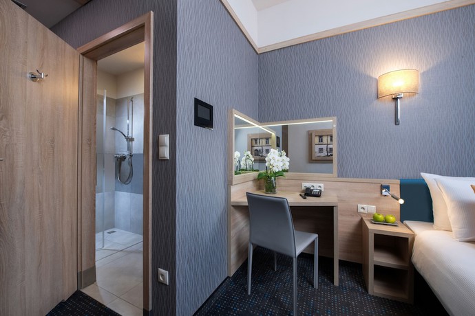 Imagen de la habitación del Hotel Leonardo Boutique Krakow Old Town. Foto 17
