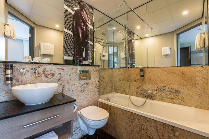 Imagen de la habitación del Hotel Leonardo Boutique Museumhotel. Foto 14