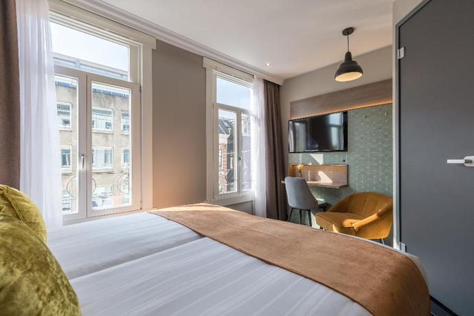 Imagen de la habitación del Hotel Leonardo Boutique Museumhotel. Foto 19