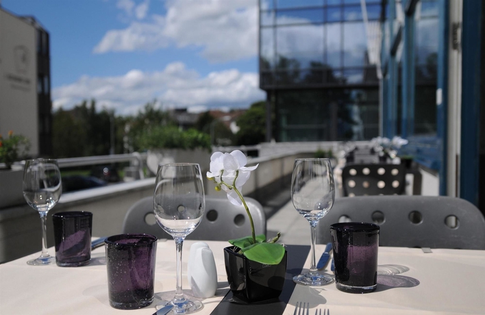 Imagen del bar/restaurante del Hotel Leonardo Boutique Rigihof Zurich. Foto 7