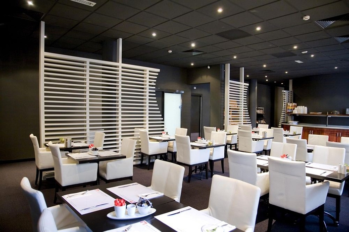 Imagen del bar/restaurante del Hotel Leonardo Breda City Center. Foto 3