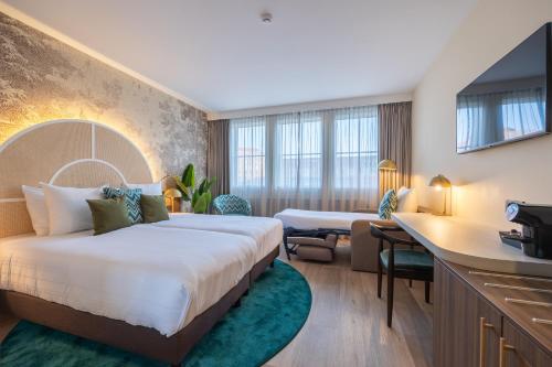 Imagen de la habitación del Hotel Leonardo Breda City Center. Foto 15