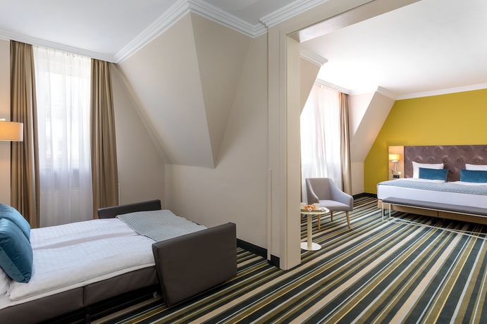 Imagen de la habitación del Hotel Leonardo Budapest. Foto 11