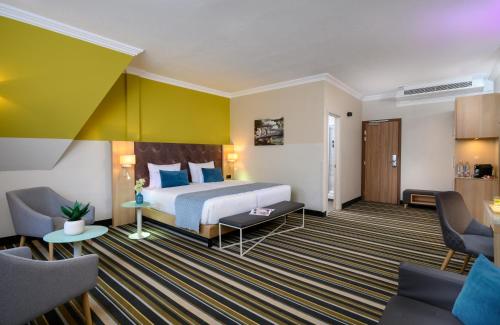 Imagen de la habitación del Hotel Leonardo Budapest. Foto 18