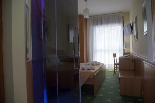 Imagen de la habitación del Hotel Leonardo Da Vinci Wellness SPA. Foto 8