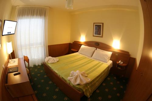 Imagen de la habitación del Hotel Leonardo Da Vinci Wellness SPA. Foto 9