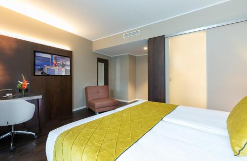 Imagen de la habitación del Hotel Leonardo Dortmund. Foto 16