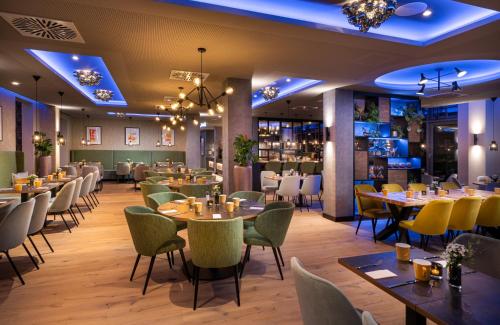 Imagen del bar/restaurante del Hotel Leonardo Eschborn Frankfurt. Foto 14