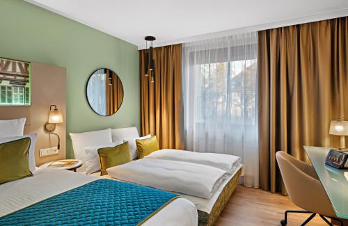 Imagen de la habitación del Hotel Leonardo Esslingen. Foto 17