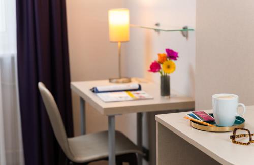 Imagen de la habitación del Hotel Leonardo Frankfurt City Center. Foto 15