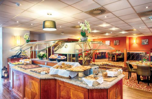 Imagen del bar/restaurante del Hotel Leonardo Hamburg City Nord. Foto 11