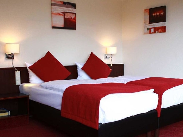 Imagen de la habitación del Hotel Leonardo Hamburg Elbbruken. Foto 3