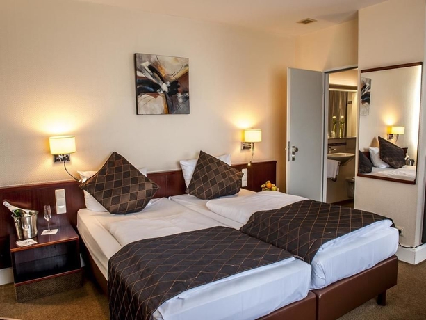 Imagen de la habitación del Hotel Leonardo Hamburg Elbbruken. Foto 5