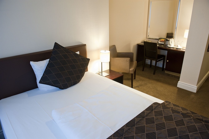 Imagen de la habitación del Hotel Leonardo Hamburg Elbbruken. Foto 10