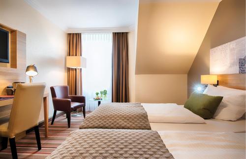 Imagen de la habitación del Hotel Leonardo Hamburg Stillhorn. Foto 20