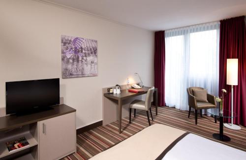 Imagen de la habitación del Hotel Leonardo Hannover Airport. Foto 13