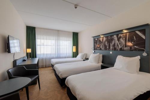 Imagen de la habitación del Hotel Leonardo Hengelo City Center. Foto 17