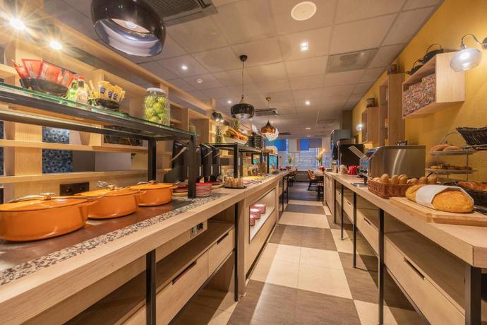 Imagen del bar/restaurante del Hotel Leonardo Hotel Amsterdam City Center. Foto 3