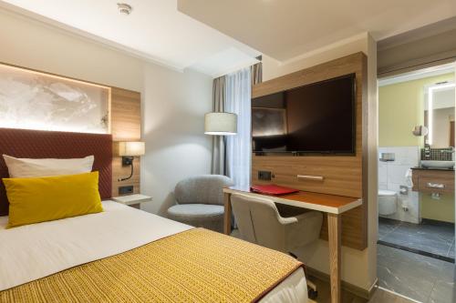 Imagen de la habitación del Hotel Leonardo Hotel Antwerpen. Foto 15