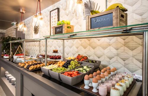 Imagen del bar/restaurante del Hotel Leonardo Hotel Barcelona Gran Via. Foto 13