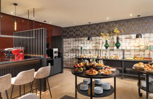 Imagen del bar/restaurante del Hotel Leonardo Hotel Bucharest City Center. Foto 9