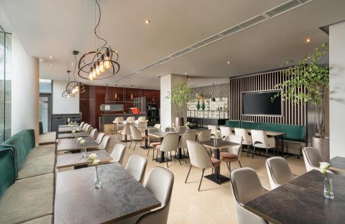 Imagen del bar/restaurante del Hotel Leonardo Hotel Bucharest City Center. Foto 12