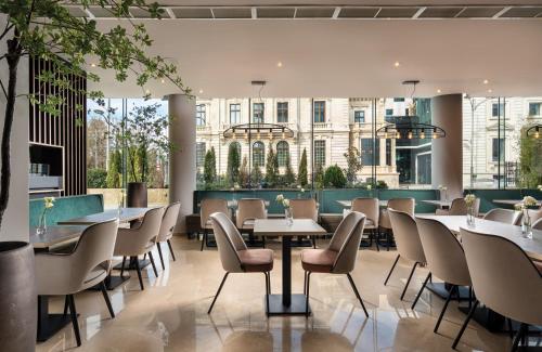 Imagen del bar/restaurante del Hotel Leonardo Hotel Bucharest City Center. Foto 13