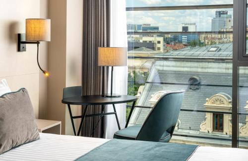 Imagen de la habitación del Hotel Leonardo Hotel Bucharest City Center. Foto 18