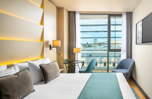 Imagen de la habitación del Hotel Leonardo Hotel Bucharest City Center. Foto 20